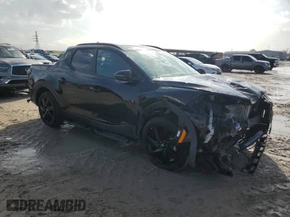 2024 Hyundai Santa Cruz Night Edition с VIN 5NTJCDDF7RH124723, выставлен на аукционе Copart как лот 85422844 с пробегом 5 545 миль миль и Списание • Salvage title. История ставок и продаж доступна на DreamBid. Изображение 4.