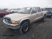 ✅ 2004 Dodge Dakota SLT • VIN: 1D7HG48NX4S596370 • Lot: 41760565. Listed on IAAI with 232,409 mi. Free auction sales archive from the USA and detailed vehicle history report at DreamBid. Image 2.