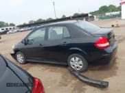 ✅ 2009 Nissan Versa 1.6 • VIN: 3N1CC11E59L494296 • Lot: 42690224. Listed on IAAI with 218,467 mi. Free auction sales archive from the USA and detailed vehicle history report at DreamBid. Image 15.