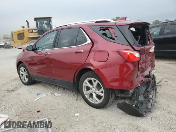 ✅ 2018 Chevrolet Equinox Premier • VIN: 2GNAXMEVXJ6166845 • Лот: 86436465. Опубликован ранее на Copart с пробегом 124 524 миль. Бесплатный доступ к архиву аукционных продаж из США и подробный отчёт об истории автомобиля на DreamBid. Изображение 2.