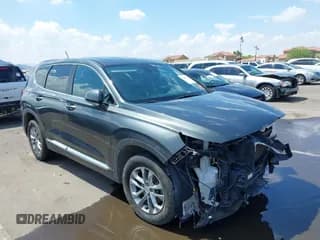 ✅ 2020 Hyundai Santa Fe SE • VIN: 5NMS23AD3LH156012 • Lot: 43082724. Listed on IAAI with 96,771 mi. Free auction sales archive from the USA and detailed vehicle history report at DreamBid. Image 1.