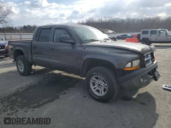 ✅ 2004 Dodge Dakota Sport • VIN: 1D7HG38K94S504357 • Лот: 42763975. Опубликован ранее на Copart с пробегом 196 577 миль. Бесплатный доступ к архиву аукционных продаж из США и подробный отчёт об истории автомобиля на DreamBid. Изображение 4.