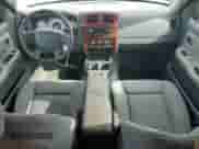 2006 Dodge Dakota SLT z VIN 1D7HE48NX6S539725, wystawiony jako Copart lot #72947004 z przebiegiem 199 562 mil mil oraz Szkoda całkowita • Salvage title. Historia ofert i sprzedaży dostępna na DreamBid. Obrazek 8.