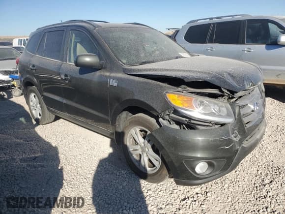 ✅ 2012 Hyundai Santa Fe Limited • VIN: 5XYZKDAG3CG110463 • Lot: 70720384. Listed on Copart with 123,928 mi. Free auction sales archive from the USA and detailed vehicle history report at DreamBid. Image 4.