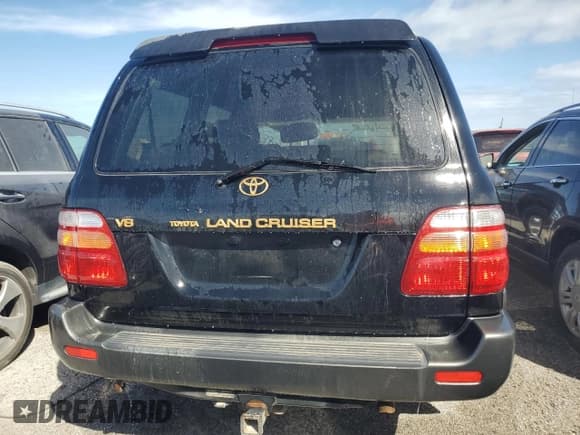 ✅ 2000 Toyota Land Cruiser • VIN: JT3HT05J8Y0083057 • Lot: 75249574. Listed on Copart with Not provided. Free auction sales archive from the USA and detailed vehicle history report at DreamBid. Image 6.