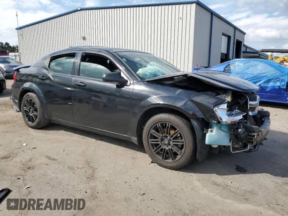 2014 Dodge Avenger SE с VIN 1C3CDZAB1EN190332, выставлен на аукционе Copart как лот 70252014 с пробегом 149 858 миль миль и Списание • Salvage title. История ставок и продаж доступна на DreamBid. Изображение 4.