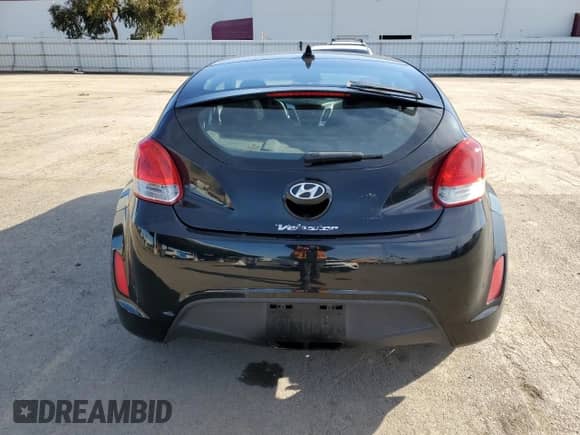 2012 Hyundai Veloster w/Red Int z VIN KMHTC6AD2CU065143, wystawiony jako Copart lot #87262524 z przebiegiem 111 448 mil mil oraz Czysty tytuł • Clean title. Historia ofert i sprzedaży dostępna na DreamBid. Obrazek 6.