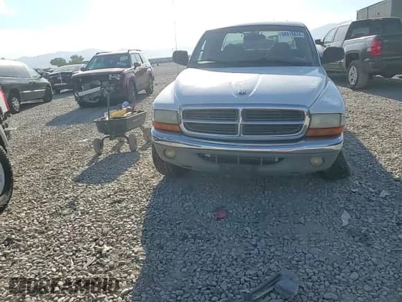 2001 Dodge Dakota Sport z VIN 1B7HG2AN71S260163, wystawiony jako Copart lot #68867304 z przebiegiem 250 426 mil mil oraz Szkoda całkowita • Salvage title. Historia ofert i sprzedaży dostępna na DreamBid. Obrazek 10.