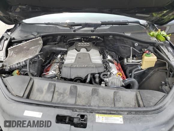 ✅ 2015 Audi Q7 S line Prestige • VIN: WA1DGAFE8FD031594 • Лот: 69850855. Опубликован ранее на Copart с пробегом 120 274 миль. Бесплатный доступ к архиву аукционных продаж из США и подробный отчёт об истории автомобиля на DreamBid. Изображение 11.