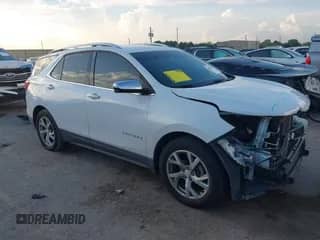 2018 Chevrolet Equinox Premier z VIN 3GNAXMEV8JS634895, wystawiony jako IAAI lot #43076870 z przebiegiem 129 376 mil mil oraz . Historia ofert i sprzedaży dostępna na DreamBid. Obrazek 1.