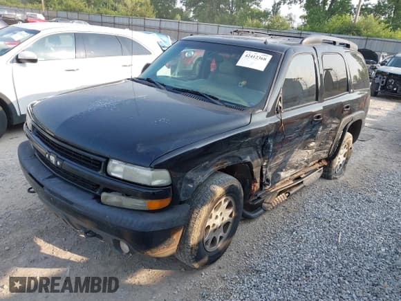 ✅ 2002 Chevrolet Tahoe LS • VIN: 1GNEK13Z42R145502 • Lot: 42412368. Listed on IAAI with 317,232 mi. Free auction sales archive from the USA and detailed vehicle history report at DreamBid. Image 2.