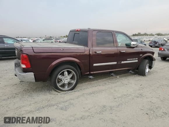 ✅ 2012 Ram 1500 Laramie • VIN: 1C6RD6NT3CS302691 • Lot: 71069485. Listed on Copart with 146,980 mi. Free auction sales archive from the USA and detailed vehicle history report at DreamBid. Image 3.