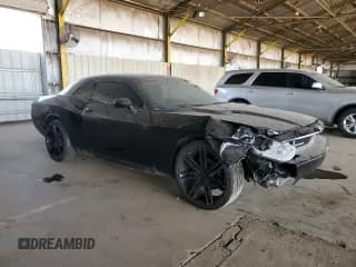 ✅ 2014 Dodge Challenger SXT • VIN: 2C3CDYAG1EH214742 • Lot: 64712454. Wystawiony na Copart z przebiegiem 144 067 mil. Bezpłatny archiwum sprzedaży aukcyjnych z USA i szczegółowy raport historii pojazdu na DreamBid. Zdjęcie 4.