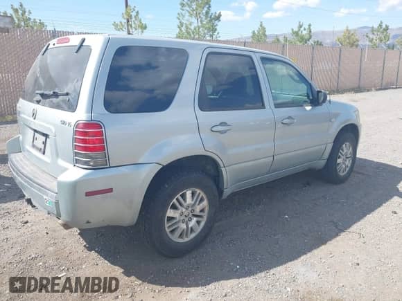 2006 Mercury Mariner Luxury z VIN 4M2CU57196KJ13921, wystawiony jako IAAI lot #42087744 z przebiegiem 183 899 mil mil oraz . Historia ofert i sprzedaży dostępna na DreamBid. Obrazek 4.