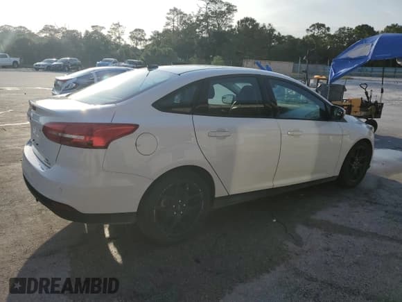 ✅ 2016 Ford Focus SE • VIN: 1FADP3F24GL235393 • Lot: 55973665. Listed on Copart with 155,437 mi. Free auction sales archive from the USA and detailed vehicle history report at DreamBid. Image 3.