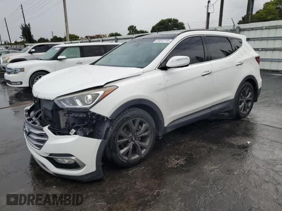 ✅ 2018 Hyundai Santa Fe Ultimate • VIN: 5XYZW4LA9JG537852 • Лот: 81812715. Опубликован ранее на Copart с пробегом 124 269 миль. Бесплатный доступ к архиву аукционных продаж из США и подробный отчёт об истории автомобиля на DreamBid. Изображение 1.
