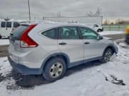 ✅ 2013 Honda CR-V LX • VIN: 2HKRM4H36DH680951 • Lot: 94702425. Listed on Copart with 168,754 mi. Free auction sales archive from the USA and detailed vehicle history report at DreamBid. Image 3.