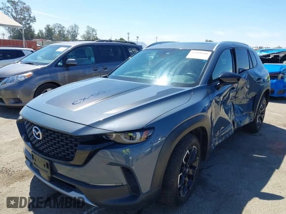 ✅ 2023 Mazda CX-50 Meridian Edition • VIN: 7MMVABXY6PN130517 • Lot: 42808080. Wystawiony na IAAI z przebiegiem 30 380 mil. Bezpłatny archiwum sprzedaży aukcyjnych z USA i szczegółowy raport historii pojazdu na DreamBid. Zdjęcie 17.
