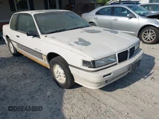 ✅ 1986 Pontiac Grand Am • VIN: 1G2NW27L1GC723322 • Лот: 42290581. Опубликован ранее на IAAI с пробегом Не указан. Бесплатный доступ к архиву аукционных продаж из США и подробный отчёт об истории автомобиля на DreamBid. Изображение 1.
