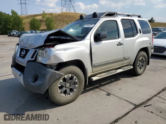 ✅ 2015 Nissan Xterra Pro-4X • VIN: 5N1AN0NW5FN653272 • Lot: 67444025. Listed on Copart with 106,250 mi. Free auction sales archive from the USA and detailed vehicle history report at DreamBid. Image 1.