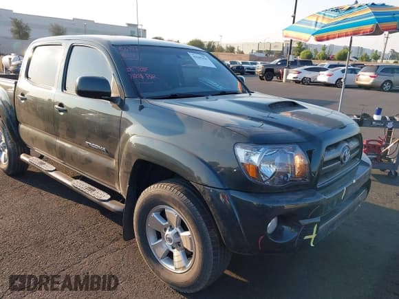 ✅ 2010 Toyota Tacoma PreRunner • VIN: 3TMJU4GN0AM092047 • Lot: 42909450. Listed on IAAI with 180,192 mi. Free auction sales archive from the USA and detailed vehicle history report at DreamBid. Image 1.