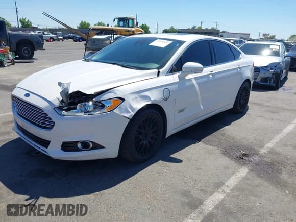 ✅ 2016 Ford Fusion Titanium • VIN: 3FA6P0SU2GR357508 • Lot: 42551834. Listed on IAAI with 177,425 mi. Free auction sales archive from the USA and detailed vehicle history report at DreamBid. Image 2.