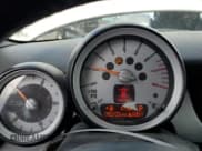 ✅ 2009 MINI Convertible • VIN: WMWMR335X9TU95543 • Лот: 81501015. Опубликован ранее на Copart с пробегом 92 132 миль. Бесплатный доступ к архиву аукционных продаж из США и подробный отчёт об истории автомобиля на DreamBid. Изображение 9.