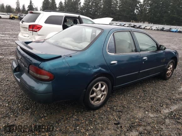 ✅ 1997 Nissan Altima XE • VIN: 1N4BU31D3VC222205 • Lot: 84018274. Listed on Copart with 261,349 mi. Free auction sales archive from the USA and detailed vehicle history report at DreamBid. Image 3.