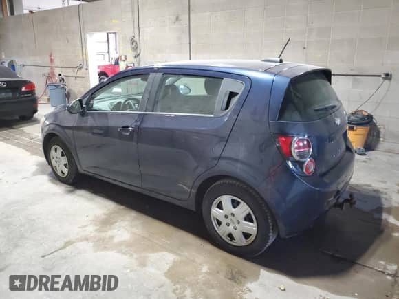 2015 Chevrolet Sonic LS with VIN 1G1JA6SG3F4114311, listed as a Copart auction lot 84742035 with 145,773 mi miles and Salvage title. Bid and sale history available at DreamBid. Image 2.