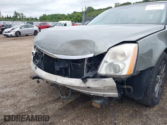✅ 2011 Cadillac DTS Premium Collection • VIN: 1G6KH5E62BU114723 • Lot: 43028847. Listed on IAAI with 114,469 mi. Free auction sales archive from the USA and detailed vehicle history report at DreamBid. Image 6.