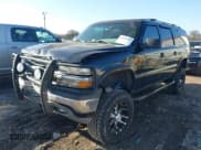 ✅ 2001 Chevrolet Suburban LS • VIN: 3GNEC16T61G284128 • Лот: 41102555. Опубликован ранее на IAAI с пробегом 198 323 миль. Бесплатный доступ к архиву аукционных продаж из США и подробный отчёт об истории автомобиля на DreamBid. Изображение 2.