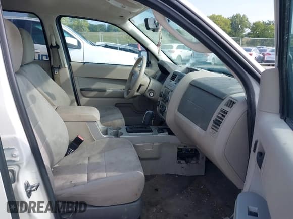 ✅ 2010 Ford Escape Hybrid • VIN: 1FMCU5K31AKD22069 • Lot: 40151027. Listed on IAAI with 185,932 mi. Free auction sales archive from the USA and detailed vehicle history report at DreamBid. Image 5.