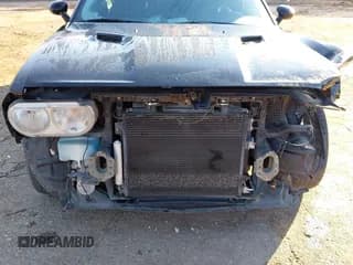 ✅ 2012 Dodge Challenger SXT • VIN: 2C3CDYAG1CH176670 • Lot: 41237080. Wystawiony na IAAI z przebiegiem 142 924 mil. Bezpłatny archiwum sprzedaży aukcyjnych z USA i szczegółowy raport historii pojazdu na DreamBid. Zdjęcie 6.