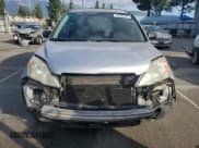 ✅ 2009 Honda CR-V LX • VIN: 5J6RE38349L012831 • Лот: 92696945. Опубликован ранее на Copart с пробегом 245 918 миль. Бесплатный доступ к архиву аукционных продаж из США и подробный отчёт об истории автомобиля на DreamBid. Изображение 5.