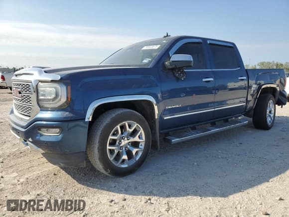 ✅ 2016 GMC Sierra 1500 Denali • VIN: 3GTP1PEJ7GG106148 • Lot: 89563875. Listed on Copart with 165,227 mi. Free auction sales archive from the USA and detailed vehicle history report at DreamBid. Image 1.