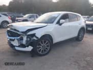 ✅ 2019 Mazda CX-5 Grand Touring • VIN: JM3KFBDM1K0650496 • Lot: 43483224. Listed on IAAI with 107,358 mi. Free auction sales archive from the USA and detailed vehicle history report at DreamBid. Image 2.