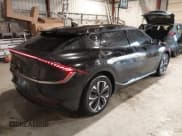 ✅ 2022 Kia EV6 Wind • VIN: KNDC3DLC0N5048724 • Лот: 43564486. Опубликован ранее на IAAI с пробегом 103 944 миль. Бесплатный доступ к архиву аукционных продаж из США и подробный отчёт об истории автомобиля на DreamBid. Изображение 4.