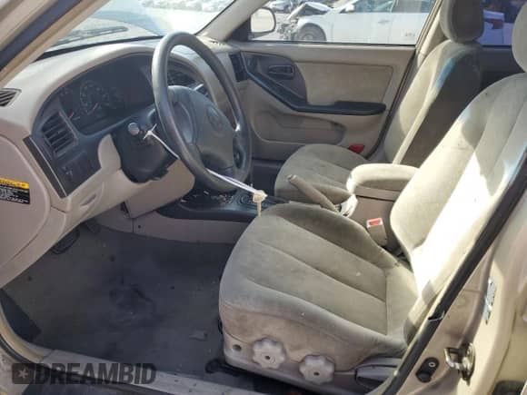 2002 Hyundai Elantra GLS z VIN KMHDN45D22U371819, wystawiony jako Copart lot #77000954 z przebiegiem 177 202 mil mil oraz Szkoda całkowita • Salvage title. Historia ofert i sprzedaży dostępna na DreamBid. Obrazek 7.