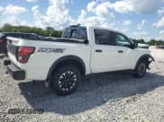 ✅ 2023 Nissan Titan Pro-4X • VIN: 1N6AA1ED0PN108003 • Лот: 64693365. Опубликован ранее на Copart с пробегом 61 188 миль. Бесплатный доступ к архиву аукционных продаж из США и подробный отчёт об истории автомобиля на DreamBid. Изображение 3.