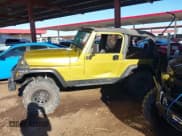 ✅ 2000 Jeep Wrangler Sport • VIN: 1J4FA49S8YP769006 • Lot: 43480409. Wystawiony na IAAI z przebiegiem Nie podano. Bezpłatny archiwum sprzedaży aukcyjnych z USA i szczegółowy raport historii pojazdu na DreamBid. Zdjęcie 14.