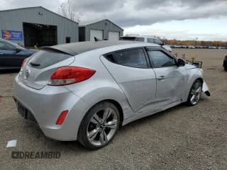 ✅ 2013 Hyundai Veloster w/Gray Int • VIN: KMHTC6AD3DU109121 • Lot: 77271244. Wystawiony na Copart z przebiegiem Nie podano. Bezpłatny archiwum sprzedaży aukcyjnych z USA i szczegółowy raport historii pojazdu na DreamBid. Zdjęcie 3.
