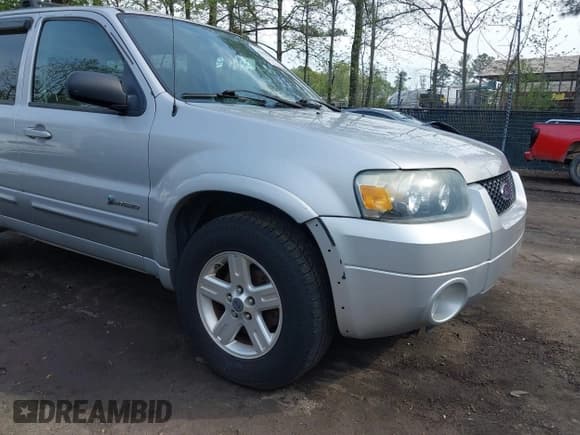 ✅ 2005 Ford Escape Hybrid • VIN: 1FMCU95H75KD90560 • Lot: 42048840. Wystawiony na IAAI z przebiegiem 137 223 mil. Bezpłatny archiwum sprzedaży aukcyjnych z USA i szczegółowy raport historii pojazdu na DreamBid. Zdjęcie 6.