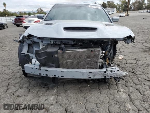 ✅ 2022 Dodge Charger SRT Hellcat Widebody • VIN: 2C3CDXL91NH100717 • Лот: 82333965. Опубликован ранее на Copart с пробегом 33 982 миль. Бесплатный доступ к архиву аукционных продаж из США и подробный отчёт об истории автомобиля на DreamBid. Изображение 5.