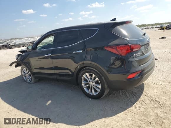 ✅ 2018 Hyundai Santa Fe 2.0T • VIN: 5XYZU4LAXJG548963 • Лот: 82633375. Опубликован ранее на Copart с пробегом 95 041 миль. Бесплатный доступ к архиву аукционных продаж из США и подробный отчёт об истории автомобиля на DreamBid. Изображение 2.