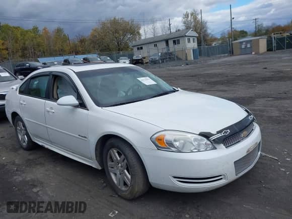 2012 Chevrolet Impala LT Fleet with VIN 2G1WG5E3XC1300734, listed as a IAAI auction lot 43513642 with 165,431 mi miles and . Bid and sale history available at DreamBid. Image 1.