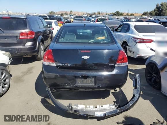 2014 Chevrolet Impala LT с VIN 2G1WB5E32E1113411, выставлен на аукционе Copart как лот 68316734 с пробегом 139 405 миль миль и Списание • Salvage title. История ставок и продаж доступна на DreamBid. Изображение 6.