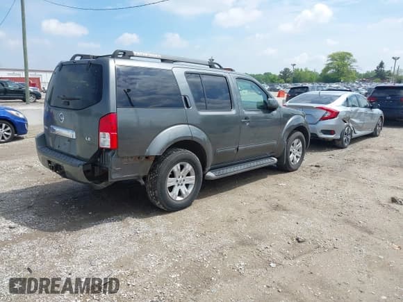 ✅ 2006 Nissan Pathfinder SE • VIN: 5N1AR18W76C641173 • Lot: 42380195. Listed on IAAI with 134,568 mi. Free auction sales archive from the USA and detailed vehicle history report at DreamBid. Image 4.