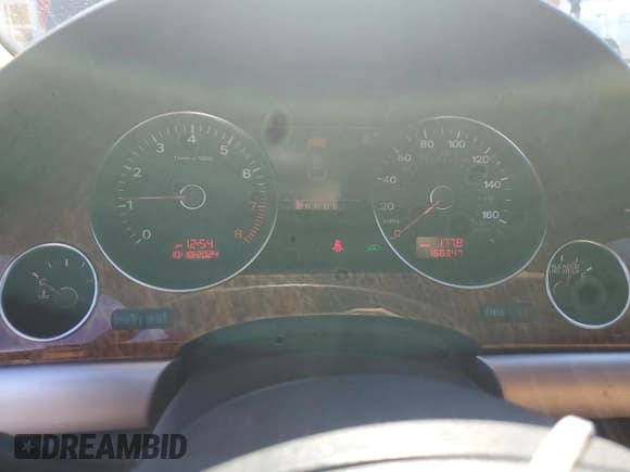 ✅ 2009 Audi A8 • VIN: WAULV94E69N002731 • Лот: 75920804. Опубликован ранее на Copart с пробегом 166 347 миль. Бесплатный доступ к архиву аукционных продаж из США и подробный отчёт об истории автомобиля на DreamBid. Изображение 9.