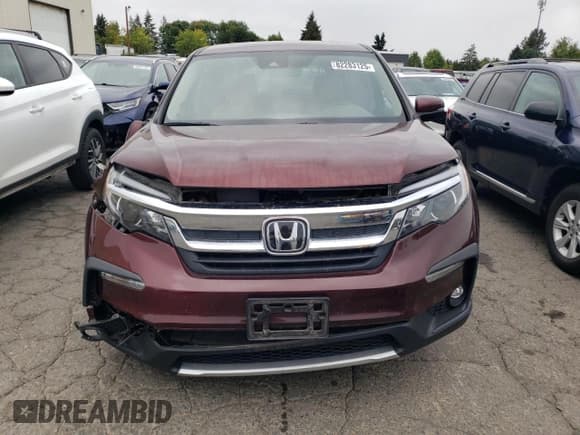 ✅ 2021 Honda Pilot EX-L • VIN: 5FNYF6H52MB083247 • Lot: 82283125. Listed on Copart with 70,309 mi. Free auction sales archive from the USA and detailed vehicle history report at DreamBid. Image 5.