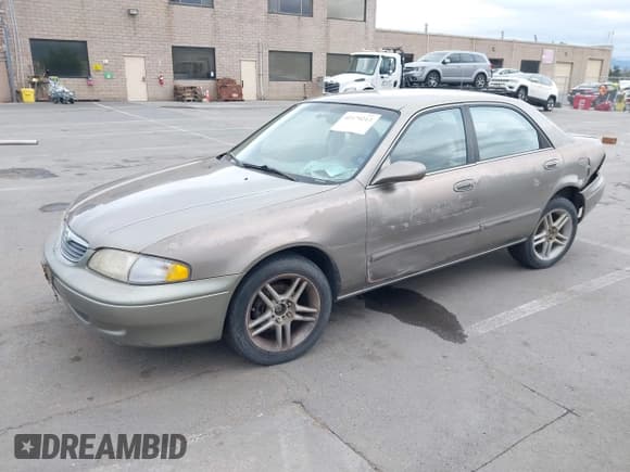 ✅ 1999 Mazda 626 ES • VIN: 1YVGF22C8X5900510 • Lot: 41479213. Listed on IAAI with 178,182 mi. Free auction sales archive from the USA and detailed vehicle history report at DreamBid. Image 17.